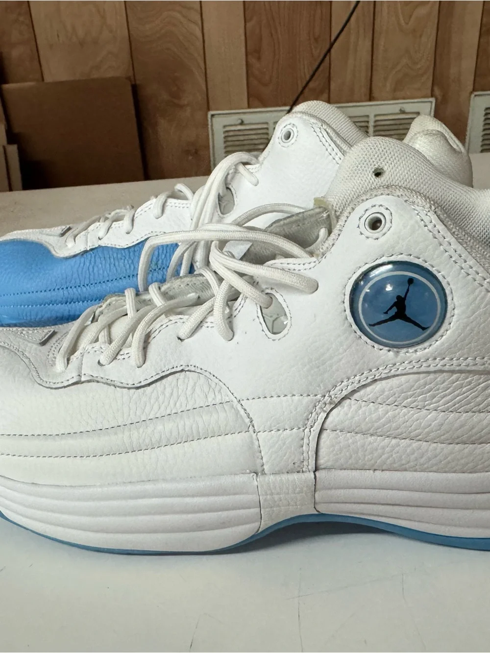 Jordan Mens 10 White and Light Blue High-Top Basketball Sneakers